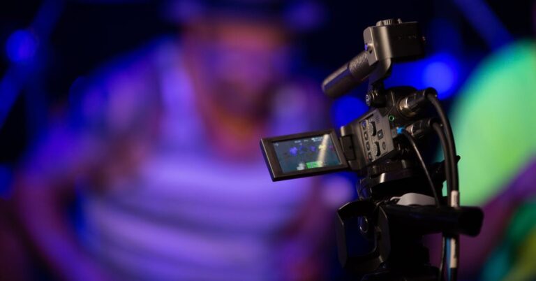 video camera in front of a blurred out background