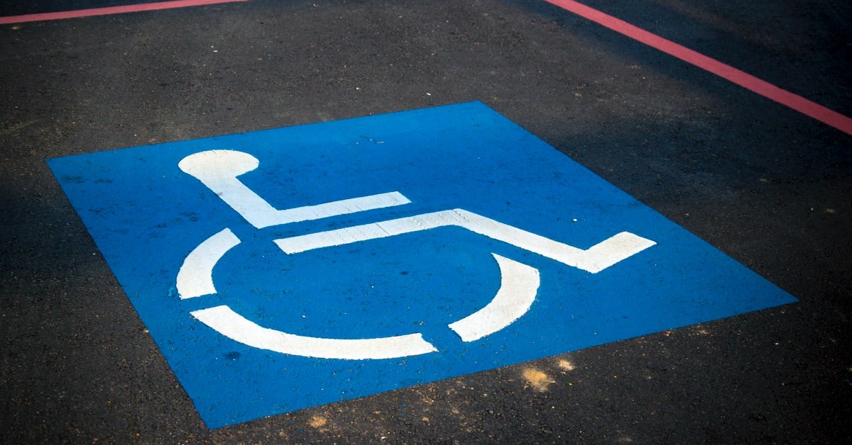 handicap parking sign in a parking space.