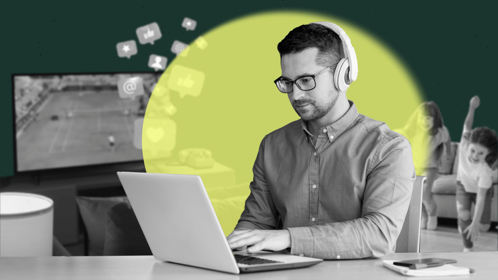 A man wearing headphones focuses intently on his laptop, immersed in his lesson, while blurred distractions like a TV and playful children appear in the background, illustrating the concept of using focus mode to boost online course completion rates.