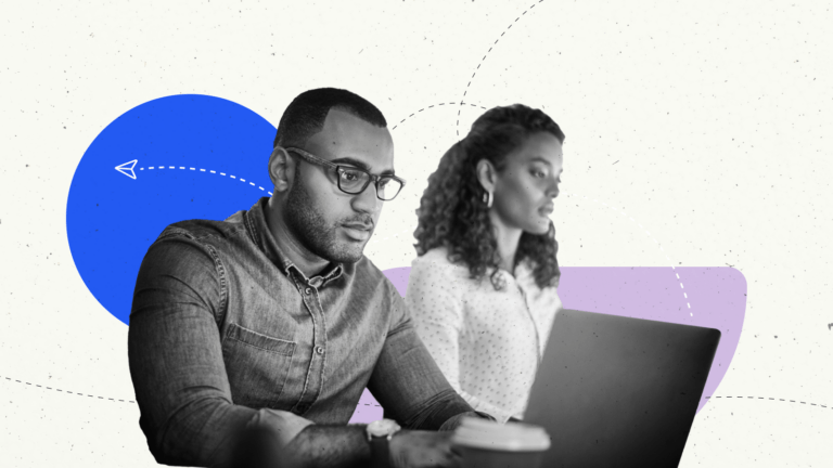 A man typing on his computer and a woman in the background.
